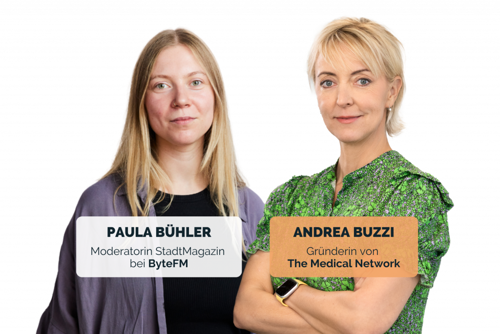 Two Women standing next to each other, One is radio Moderator Paula Bühler from ByteFM, the other is Andrea Buzzi, Founder of The Medical Network, a communications cosulting Company from Hamburg, Germany.